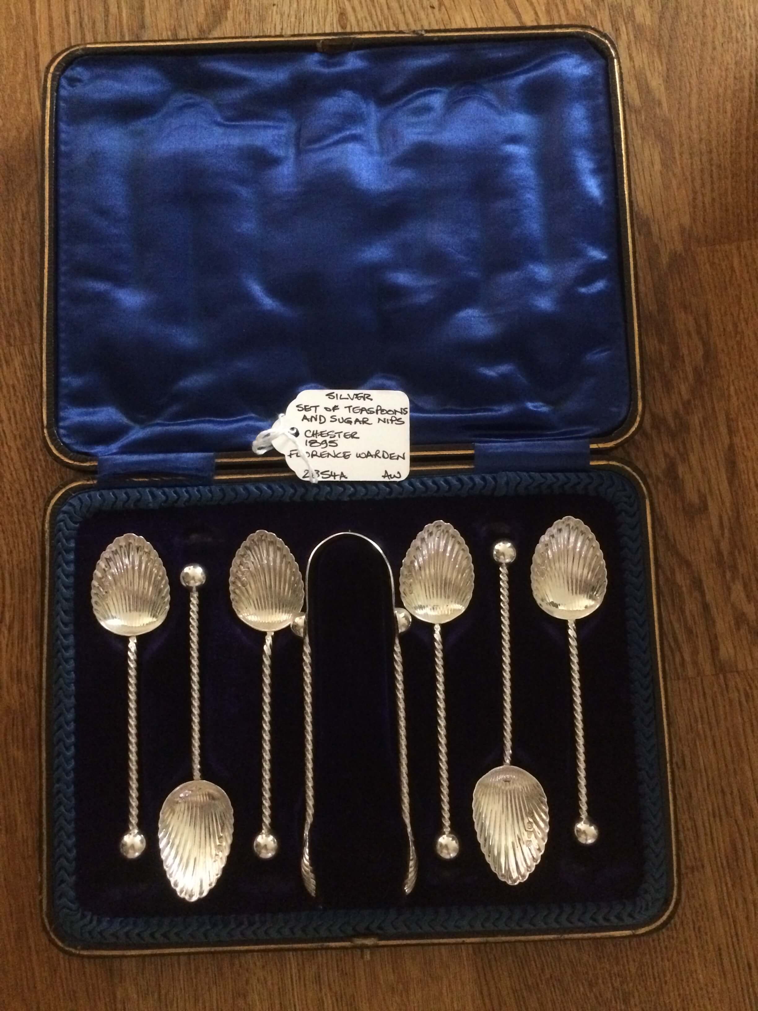 Silver Set of Teaspoons and Sugar Nip